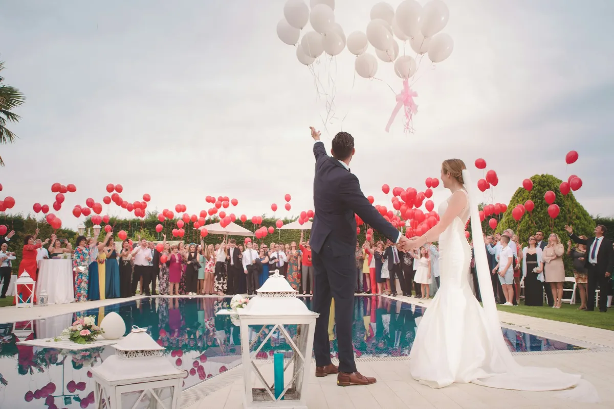 A wedding celebration with balloons · illustrative photography